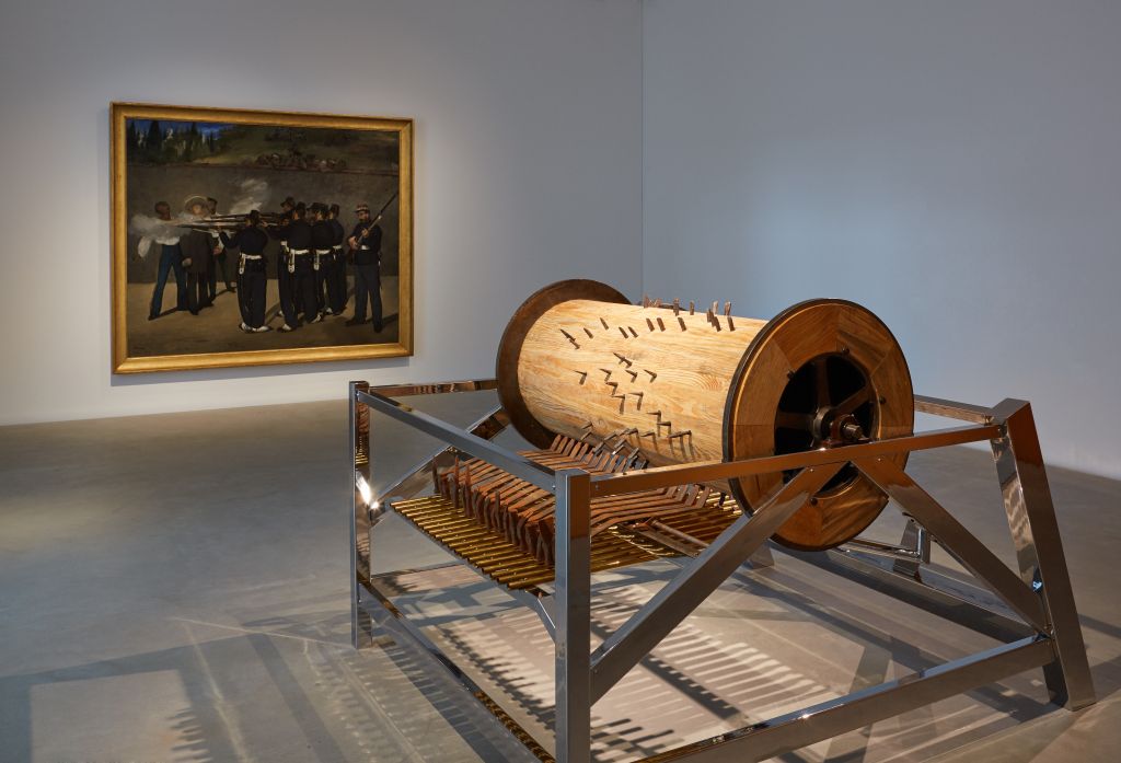 Édouard Manet: The Execution of Emperor Maximilian, 1868-69, oil on canvas, 252 x 302 cm, collection Kunsthalle Mannheim  José Antonio Vega Macotela: The Chisel and the Sinkhole, 2016/17, wood, metal, hammers, chisels, 165 × 224 × 246 cm, collection Pérez